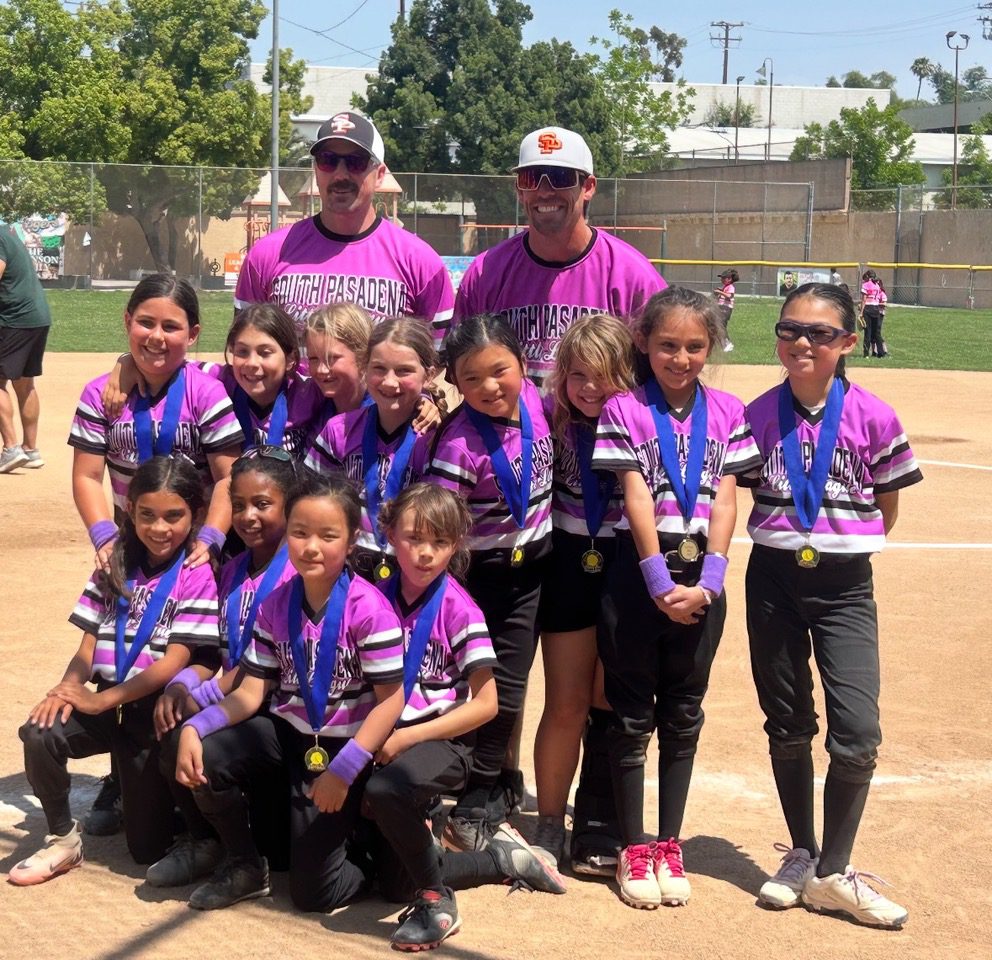 PHOTO: Little League Baseball | The South Pasadenan | The Violet Vipers Kid Pitch softball team, champions of their division, pose for a celebratory team photo with their coaches.