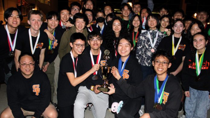 PHOTO: Benjamin Ku | The South Pasadenan | Members of the SPHS Science Olympiad team and Coach Benjamin Ku received a first-place school trophy at the Pasadena City College regional tournament.