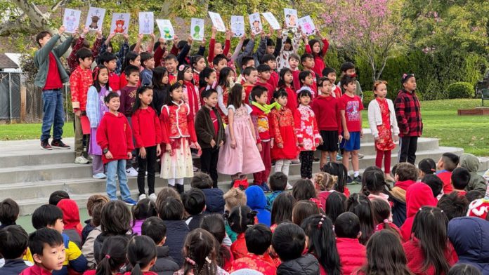 PHOTO: SPUSD | The South Pasadenan | Marengo Elementary second-grade Mandarin dual-immersion students perform a song about the Chinese zodiac calendar during a school assembly.