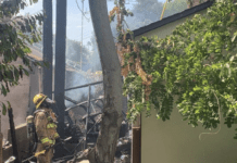 PHOTO: SPFD | The South Pasadenan | South Pasadena Firefighters, along with Alhambra Fire, Pasadena Fire, & San Marino Fire working in 107°F heatwave temperatures to extinguish residential blaze reportedly caused by downed power lines.