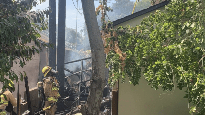 PHOTO: SPFD | The South Pasadenan | South Pasadena Firefighters, along with Alhambra Fire, Pasadena Fire, & San Marino Fire working in 107°F heatwave temperatures to extinguish residential blaze reportedly caused by downed power lines.