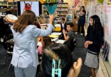 PHOTO: SPUSD | The South Pasadenan | Left: Superintendent Angela Elizondo Baxter surprises Arroyo Vista 4th Grade Teacher Jennifer Simon (back right corner) with the District Teacher of the Year honor.