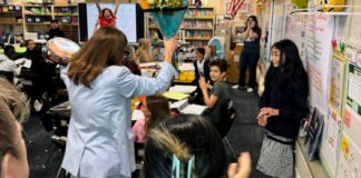 PHOTO: SPUSD | The South Pasadenan | Left: Superintendent Angela Elizondo Baxter surprises Arroyo Vista 4th Grade Teacher Jennifer Simon (back right corner) with the District Teacher of the Year honor.