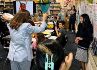 SPUSD Snapshot | Jennifer Simon Named as 2026 District Teacher of the Year PHOTO: SPUSD | The South Pasadenan | Left: Superintendent Angela Elizondo Baxter surprises Arroyo Vista 4th Grade Teacher Jennifer Simon (back right corner) with the District Teacher of the Year honor.