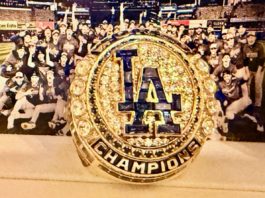 PHOTO Credit: Los Angeles Dodgers | Expertly crafted in 14-karat yellow gold, diamonds and genuine sapphires, team historian Mark Langill says the Los Angeles Dodgers’ 2024 World Series Ring honors the team’s historic season and 8th title in franchise history through artistic storytelling and impeccable detail.