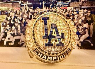 PHOTO Credit: Los Angeles Dodgers | Expertly crafted in 14-karat yellow gold, diamonds and genuine sapphires, team historian Mark Langill says the Los Angeles Dodgers’ 2024 World Series Ring honors the team’s historic season and 8th title in franchise history through artistic storytelling and impeccable detail.