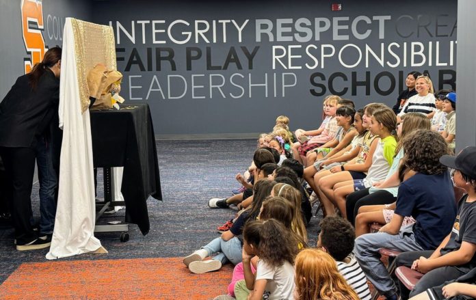 PHOTO: SPUSD | The South Pasadenan | A group of SPHS 10th graders perform a puppet show for Marengo 2nd graders