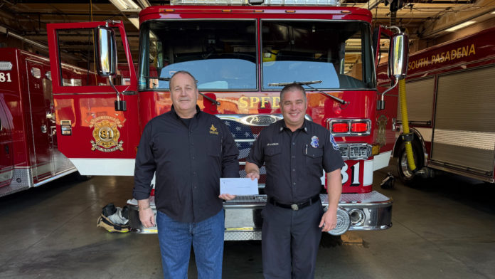 PHOTO: Esteban Lopez | The South Pasadenan | Nathaniel Brown, Master of South Pasadena Masonic Lodge No. 290, presents a donation check of over $2,000 to Fire Captain Mike Larkin at the South Pasadena Fire Department.