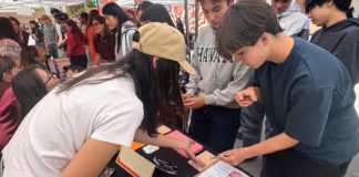 PHOTO: SPUSD | The South Pasadenan | Pediatric general surgeon Dr. Roxanne Massoumi gives students a brief lesson in suturing at the 2026 SPHS Career Fair.