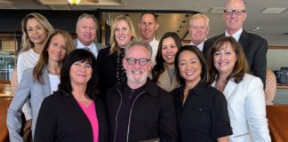Bill Buckley (center) and South Pasadena Unified School District representatives celebrated Buckley receiving the Golden Apple Award for Volunteerism. (Photo Courtesy of South Pasadena Unified School District)