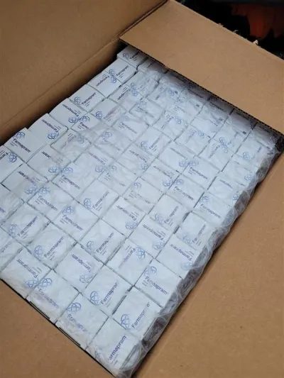 PHOTO: US Border Patrol San Diego | The South Pasadenan | Agents discover boxes full of illicit Xanax pills after a K-9 unit alerted them to a suspicious vehicle on I-5