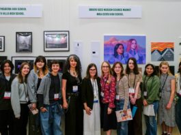PHOTP: SPHS | The South Pasadenan | SPHS students, Photography Teacher Rouzanna Berberian (center left), SPUSD Superintendent Angela Elizondo Baxter (center), and Art Teacher Aimee Levie-Hultman (center right) during the Autry Student Visual Arts Exhibition opening reception.