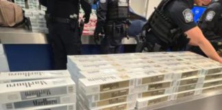 PHOTO: CBP | The South Pasadenan | CBP officers inspecting 749 cartons of contraband cigarettes at Long Beach Cruise Ship Terminal