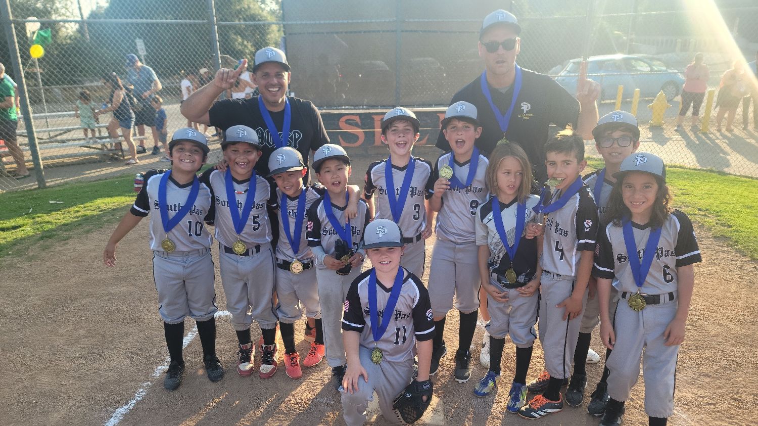 | The South Pasadenan | South Pasadena News PHOTO: Little League Baseball | The South Pasadenan | The South Pasadena Little League American League champion Silverbacks team poses for a group photo on the field with their medals and coaches.