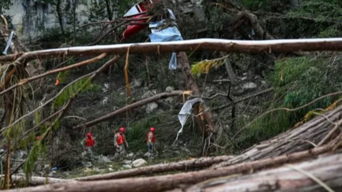PHOTO: CBSNews | Search and rescue personnel look for missing people along the Guadalupe River on July 7, 2025 in Hunt, Texas.