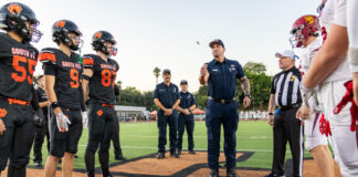 SPHS Football Honors Local First Responders on 9/11 | SPUSD Snapshot PHOTO: Mac Shropshire | The South Pasadenan | Local first responders led the coin toss during the SPHS varsity football game on September 11, 2026.