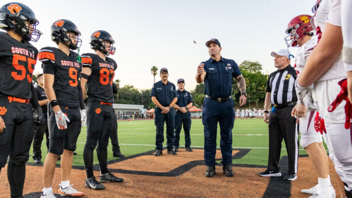 PHOTO: Mac Shropshire | The South Pasadenan | Local first responders led the coin toss during the SPHS varsity football game on September 11, 2026.