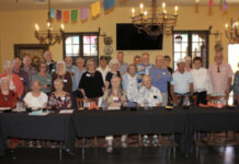 PHOTO: Sheila Tomlin | The South Pasadenan | South Pasadena High School Class of 1961 alums lined up for a group photo at their reunion luncheon marking 65 years since their graduation at Mijares Mexican Restaurant on October 14, 2026.