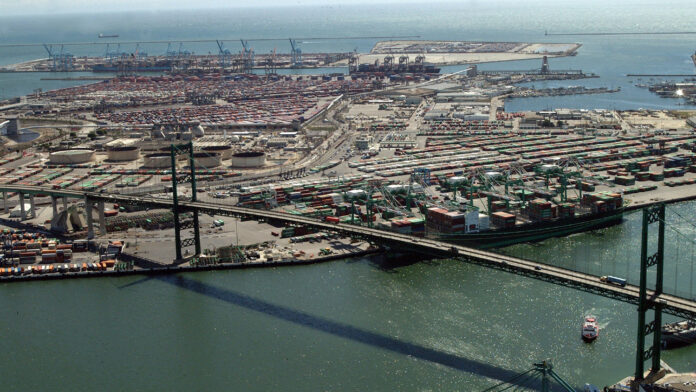PHOTO: U.S. Coast Guard photo by PA3 Louis Hebert, March 17, 2003 | The South Pasadenan | An archival aerial view shows the Vincent Thomas Bridge and the Port of Los Angeles.