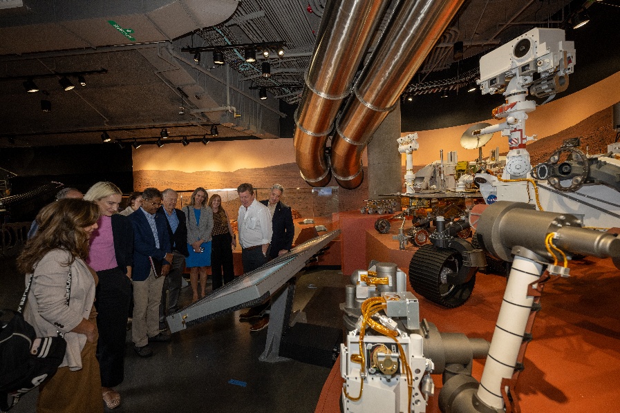 | The South Pasadenan | South Pasadena News PHOTO: California Science Center | The South Pasadenan | California Science Center, JPL, and Caltech leaders tour the Kent Kresa Space Gallery, which features artifacts and content representing 60 years of JPL robotic exploration. A model of NASA’s Perseverance Mars rover is visible in the foreground at right.