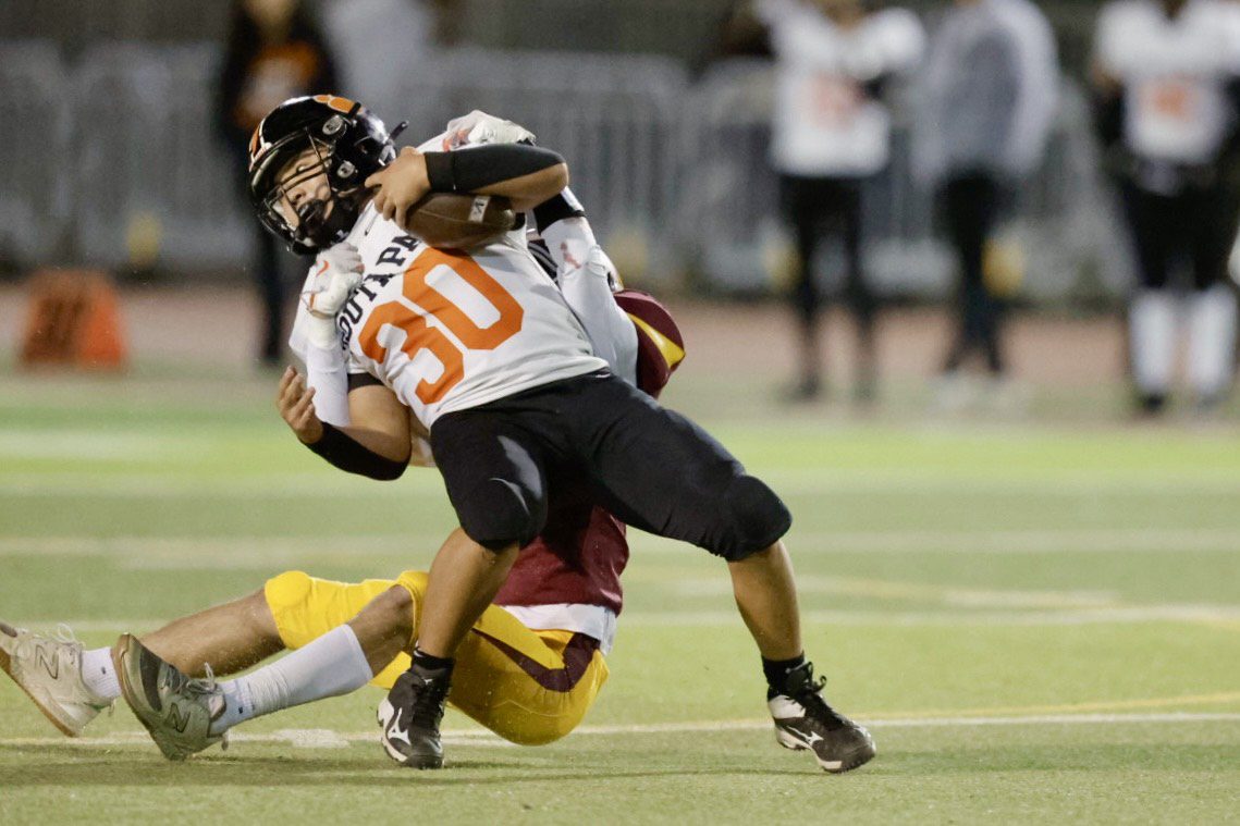 | The South Pasadenan | South Pasadena News PHOTO: Dan Rider | The South Pasadenan | It took South Pasadena High nearly 50 years to celebrate its first outright Rio Hondo League football championship Friday night, as the Tigers turned away La Cañada 28-10 on the road.