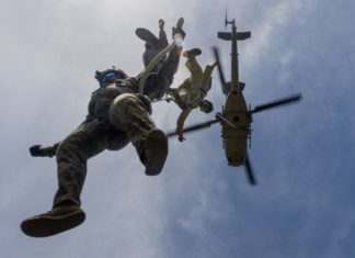 PHOTO: USMC Cpl. Kyle Chan. HMLA-367 supports helicopter rope suspension training.