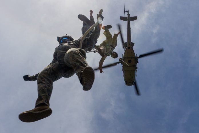 PHOTO: USMC Cpl. Kyle Chan. HMLA-367 supports helicopter rope suspension training.