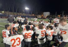 PHOTO: Anthony Chan | SPHS Tigers Football | coach Jeff Chi talking to his team after 35-21 CIF quarterfinal victory over St. Margaret’s Friday night.