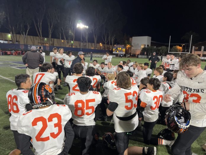 PHOTO: Anthony Chan | SPHS Tigers Football | coach Jeff Chi talking to his team after 35-21 CIF quarterfinal victory over St. Margaret’s Friday night.