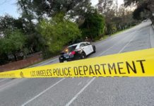 PHOTO: The South Pasadenan News | LAPD crime scene tape blocks off Marmion Way from the South Pasadena side to the 110 Freeway entrance/exit as officers investigate a shooting that occurred Saturday night.