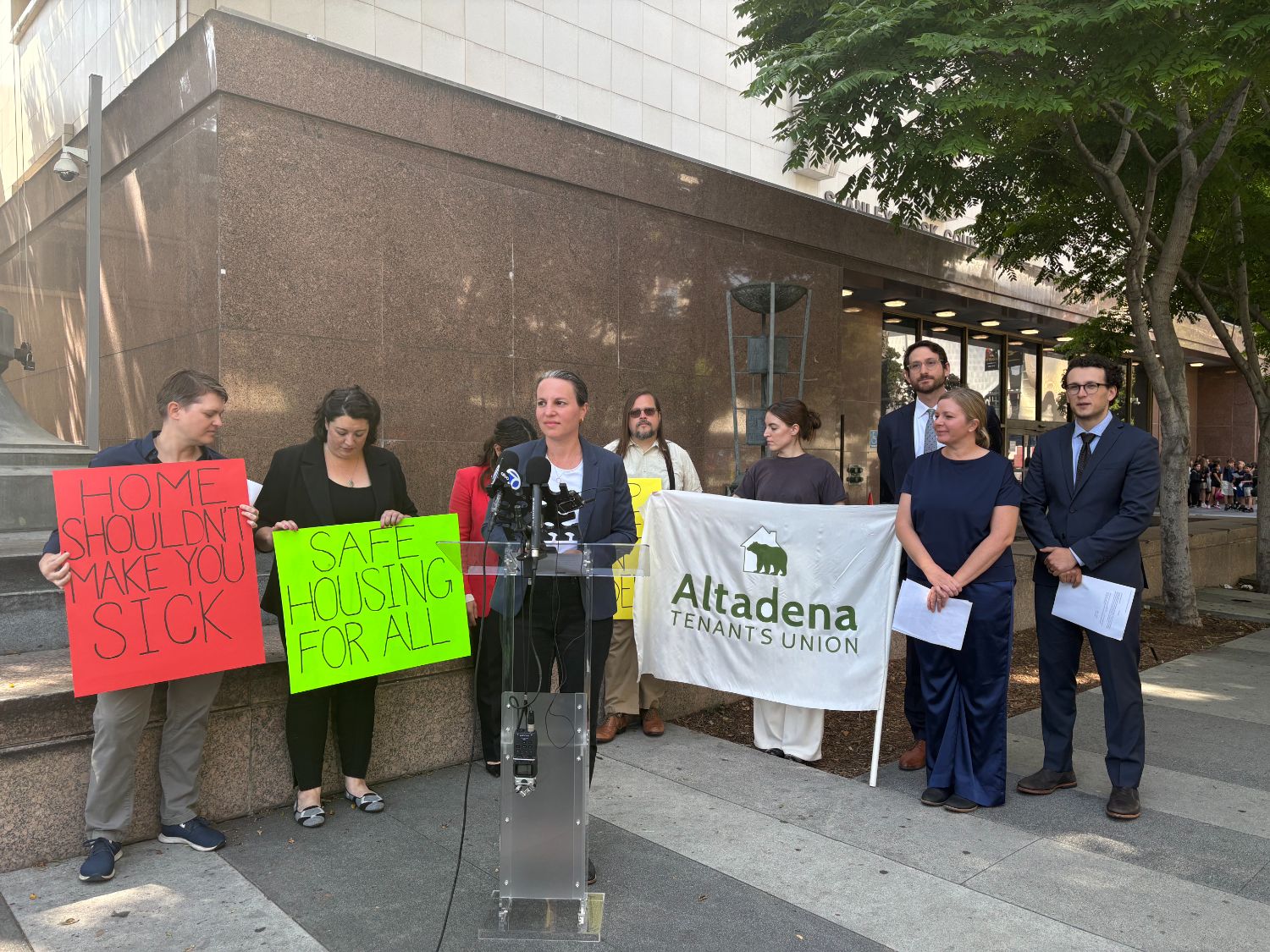 | The South Pasadenan | South Pasadena News PHOTO: Audrey DeGroot | South Pasadenan News | Tenant advocates, wildfire survivors, and legal representatives from Neighborhood Legal Services and Morrison Foerster gather outside the Stanley Mosk Courthouse on May 22, 2025, to announce a lawsuit against the City of Pasadena and Los Angeles County for failing to protect renters from toxic conditions following the Eaton Fire.