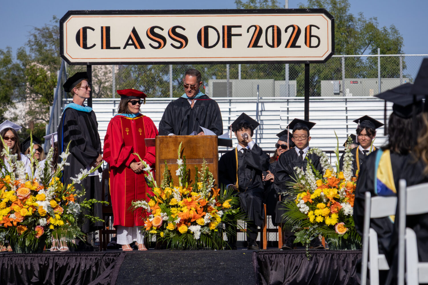 PHOTO: South Pasadena News | Mac Shropshire | SPHS Graduation 2026: Principal John Eldred presents the class of 2026 to SPUSD Superintendent Dr. Angela Elizondo Baxter and School Board President Dr. Michele Kipke.