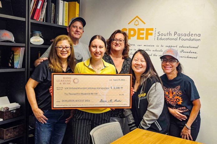 PHOTO: South Pasadena Educational Foundation & Hodis Learning accepting donation as a percentage of tutoring services provided to South Pasadena students and families.