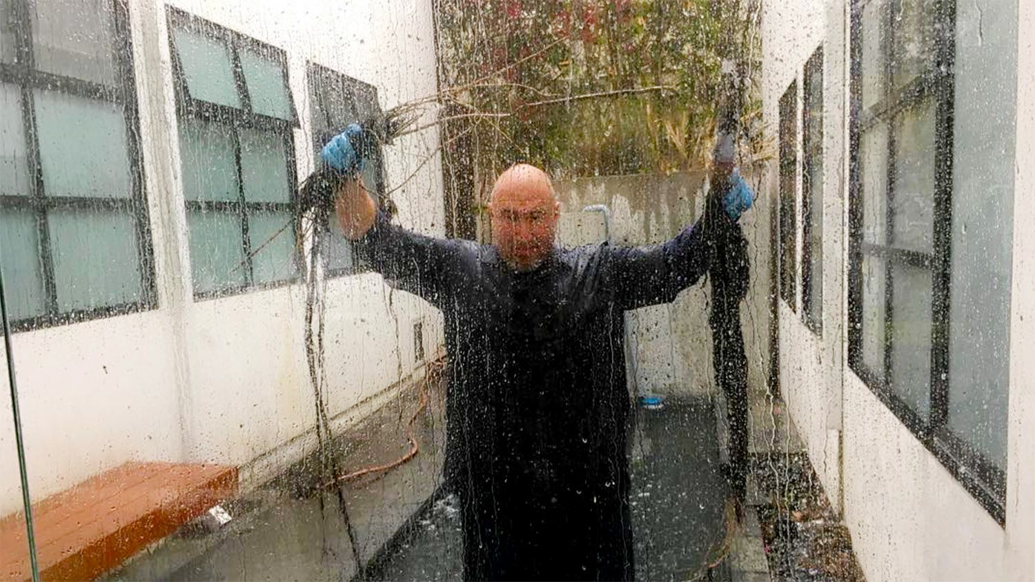 PHOTO:'Professional Drain Service' Plumbing | Rainstorm caused localized, on-property flooding due to a 