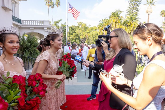 Pasadena Rose Queen 2024 Naomi Stillitano | The Inside Story: The Glory of Christmas Eve Pasadena Rose Queen PHOTO: BY PASADENA TOURNAMENT OF ROSES® | 2024 Rose Queen® Naomi Stillitano speaking with local television news KTLA at the 105th Rose Queen Coronation.