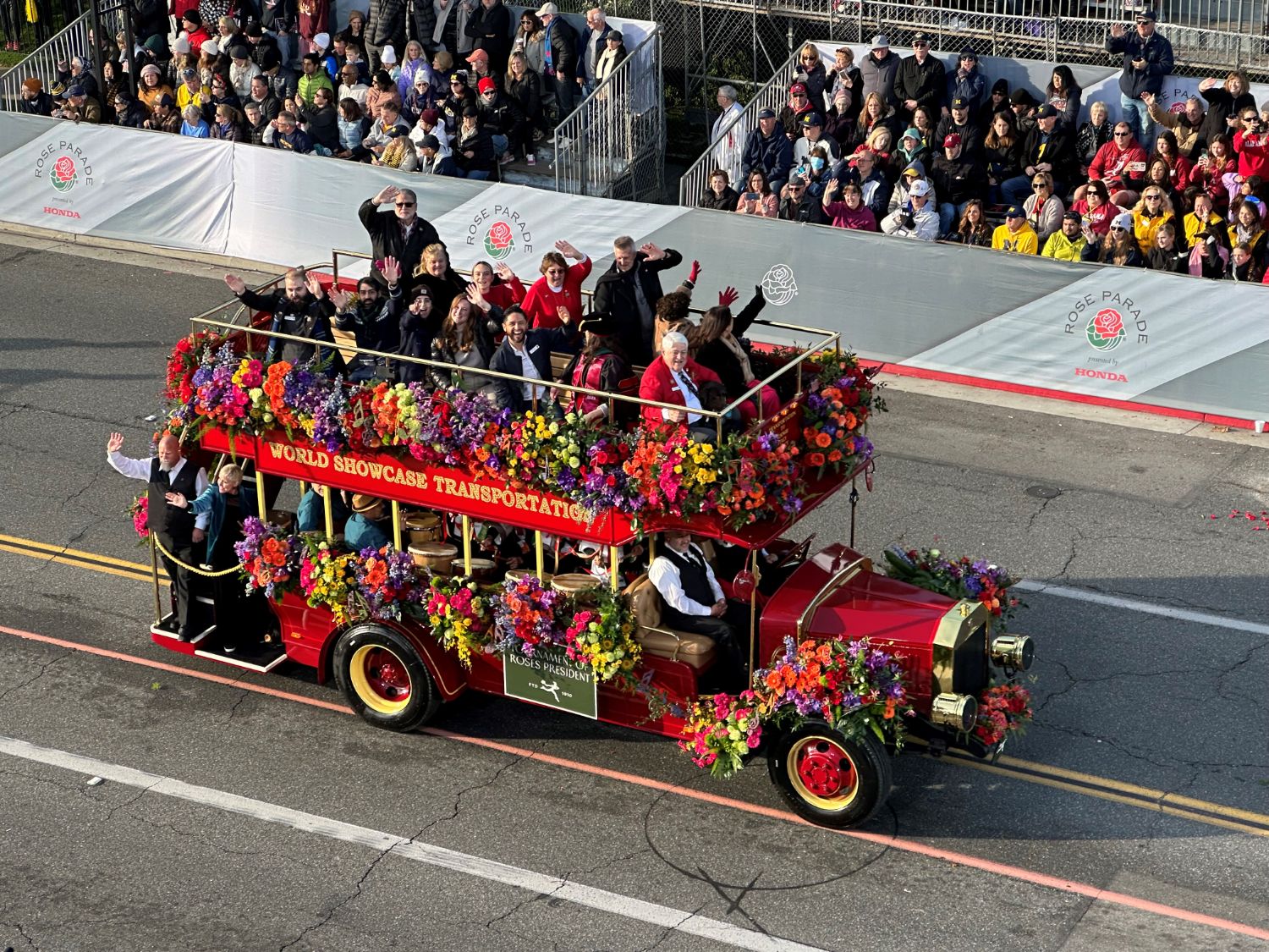 | The South Pasadenan | South Pasadena News PHOTO: Bill Glazier | The South Pasadenan | Tournament of Roses President Alex Aghajanian, wearing red coat, is joined by family and friends aboard colorful vehicle.