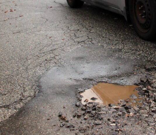 PHOTO: Henk Friezer | The South Pasadenan | A pothole on Monterey and Marengo in South Pasadena.