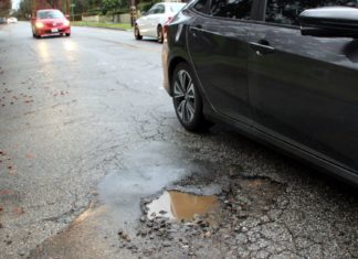 PHOTO: Henk Friezer | The South Pasadenan | A pothole on Monterey and Marengo in South Pasadena.