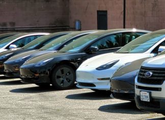 PHOTO: TESLA - Tina Kistinger | The South Pasadenan News | Newly delivered Tesla Model 3's at the South Pasadena Police Station. The next steps include converting the vehicles into fully operational police units, and installing the charging stations.