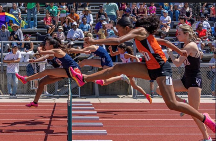 PHOTO: Raymond Tran | The South Pasadenan | Mia Holden in the 300m hurdles at CIF Master's Meet - 6th place at 43.95. She set school record the week prior with 43.81 at CIF SS D3 championships.