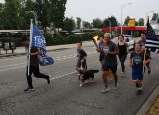 Flame of Hope Carried by Police Chief