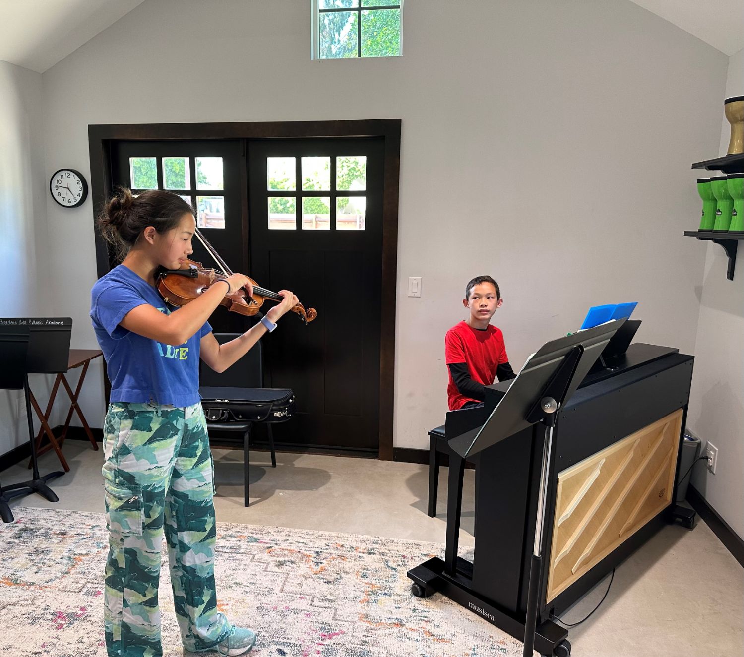PHOTO: Rebecca Ward | The South Pasadenan | Juniper Chao (violin) and William Hubbard (piano) playing Sonata in G Major by Wolfgang Amadeus Mozart in the Carriage House at South Pasadena Arts & Music Academy.
