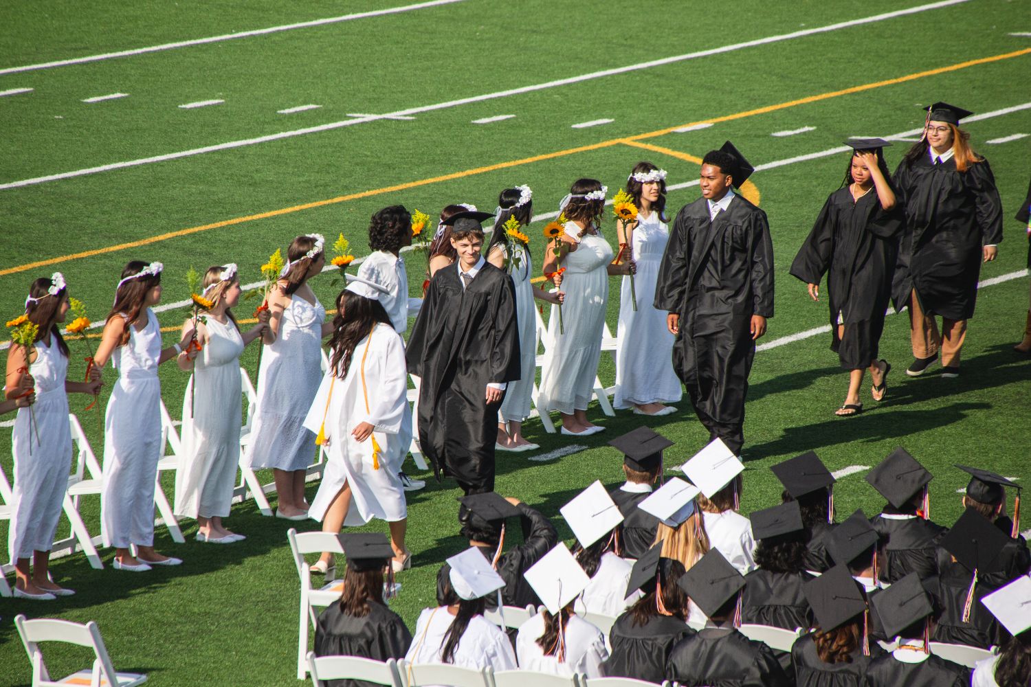 | The South Pasadenan | South Pasadena News PHOTO: Shari Correll | The South Pasadenan | Class of 2024 graduates at Ray Solari stadium at South Pasadena High School.