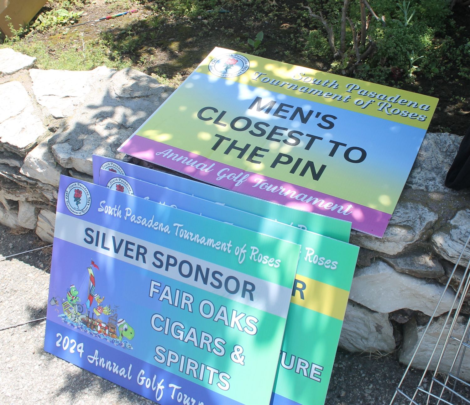 | The South Pasadenan | South Pasadena News PHOTO: Sally Kilby | The South Pasadenan | Businesses and others purchase Tee signs that are placed at holes throughout the course. Retail store operators are able to display them after the tournament to show their support for the South Pasadena float. Other signs designate holes with specific awards.