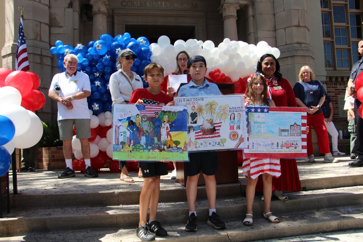 PHOTO: Melissa Snyder | The South Pasadenan | Decked out in plenty of red, white and blue, 4th of July in South Pasadena featured a traditional pancake breakfast, parade along Mission Street and old-fashioned fireworks show at South Pasadena High School to cap the day. 4th of July SPARC poster winners 5th graders Luca from Marengo (1st place), Reeve from Marengo (2nd place) and Emery from Monterey Hills (3rd place).