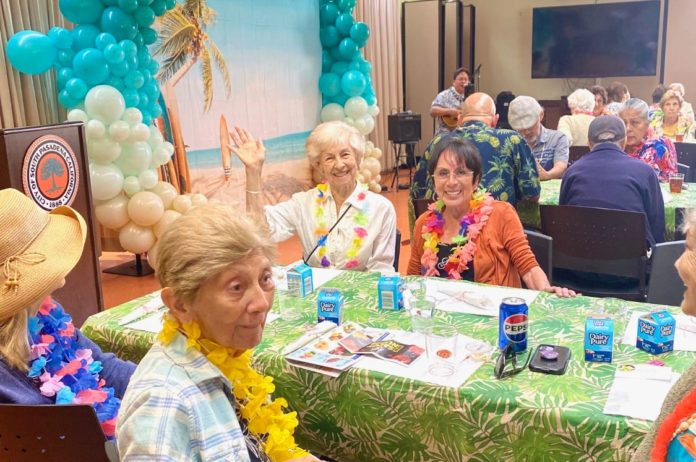 PHOTO: provided by Kathrin Richards | The South Pasadenan | Seniors enjoy the end of summer luau at the South Pasadena Senior Center.