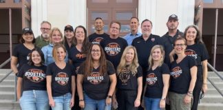 PHOTO: provided by SPHS Booster Club | The South Pasadenan | SPHS Booster Club board members: Bottom Row L-R: Stephanie Burchardt, Megan Gardner, Toby Bangar (with Ember), Nichole Dunville, Kristin Wingard, Kristen Swift Middle Row L-R: Aman Thind, Rachel Fox, Jill Olsen, David Zeiger, Eric Chabot, Amy Davis Jones Top Row L-R: Bill Buckley, Val Huntley, Dan Wakumoto, Principal John Eldred, Interim Athletic Director CB Richards
