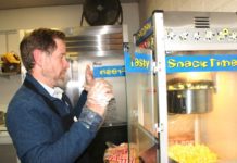 Serving The Crowd | Mayor Jon Primuth in Service to SPHS Football Fans PHOTO: Henk Friezer | The South Pasadenan | Mayor Jon Primuth serving up hot popcorn at the SPHS football game Friday evening.