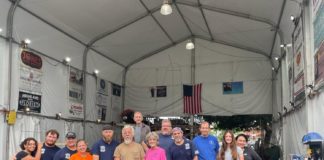 PHOTO: provided by SPTOR | The South Pasadenan | Crew on a recent Saturday workday at the War Memorial Building float site consisted of (left to right) Alexandra Strong, Brandon Carlson, Rob Benjamin, Janet Benjamin, Jeremy Bruce (not standing), Bryce Quinn, Steve Fillingham, Kris Nagle, Sharon Mitchell, James Jontz, Brant Dunlap, Bill Hodson, Katlyn Hodson and Victoria Rea. Not pictured: Sandy Fielding.