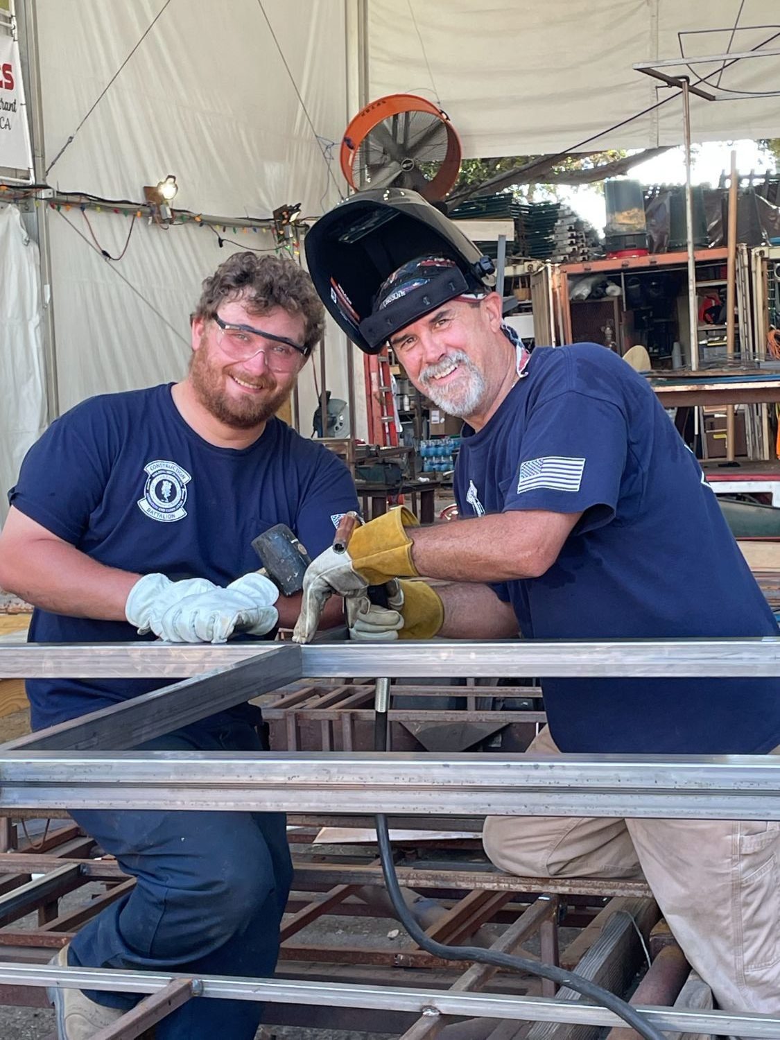 | The South Pasadenan | South Pasadena News PHOTO: provided by SPTOR | The South Pasadenan | SPTOR construction crew members Brandon Carlson (left) and Brant Dunlap work on preparing the base for a vintage turntable that will appear on the 2024 South Pasadena float.